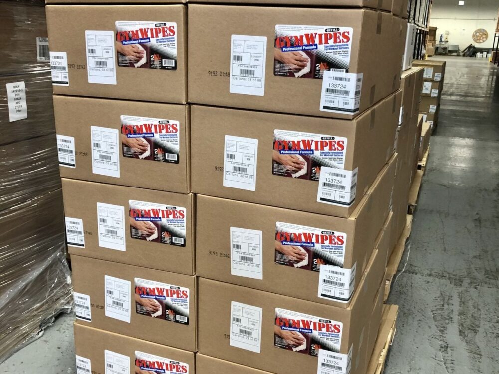 GymWipes Boxes of Gymwipes on pallet in a warehouse.